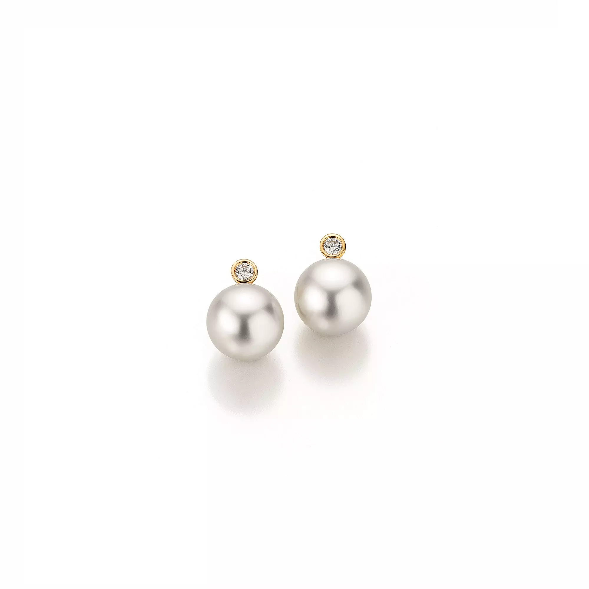 Ohrschmuck aus Gelbgold mit Südsee-Zuchtperlen und Diamanten