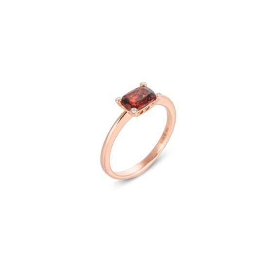 Ring aus 18 Karat Roségold mit Granat und Diamanten