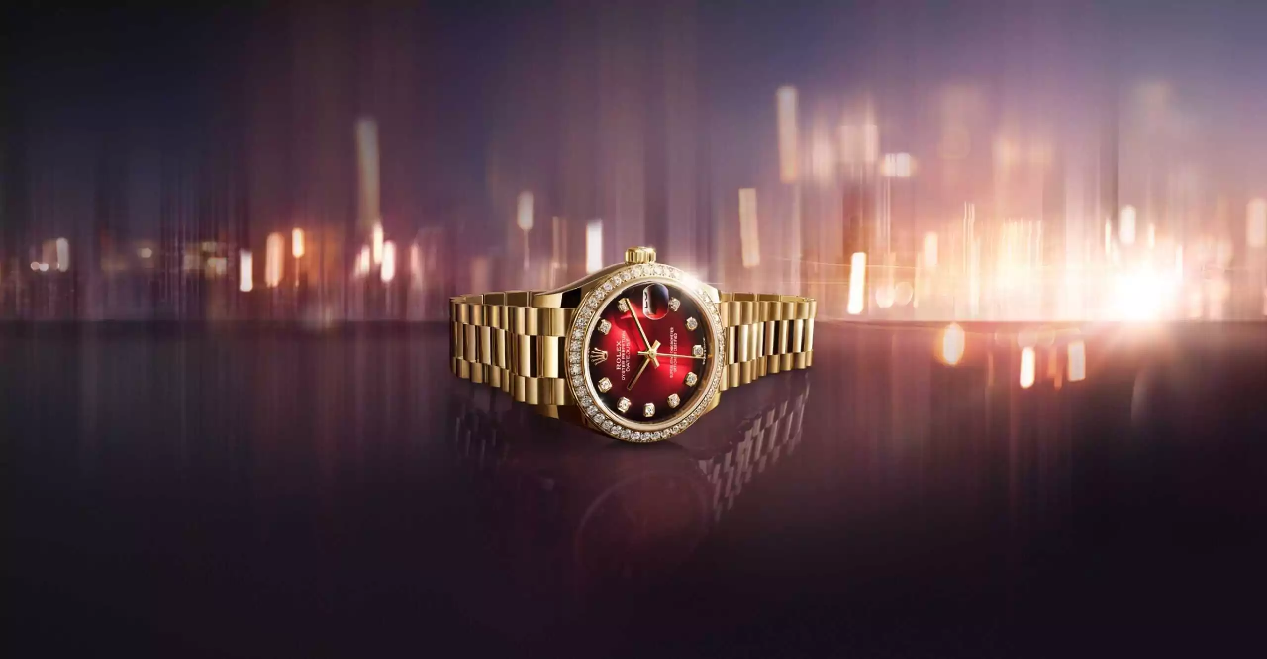 Die neue Datejust 31 in Gelbgold mit Zifferblatt in Rot ombre und President-Band