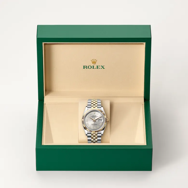 Rolex Datejust in Rolesor gelb (Kombination aus Edelstahl Oystersteel und Gelbgold) in grüner Schatulle