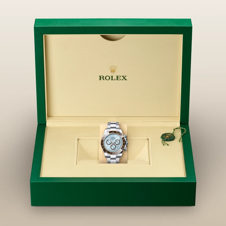 Rolex Cosmograph Daytona in Platin in grüner Schatulle