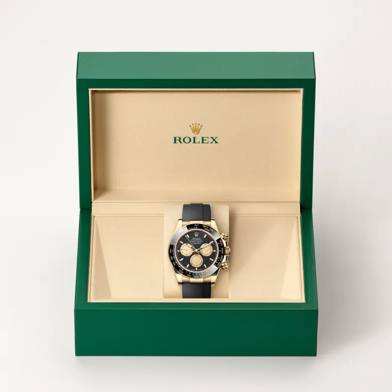 Rolex Cosmograph Daytona in 18 Karat Gelbgold in grüner Schatulle