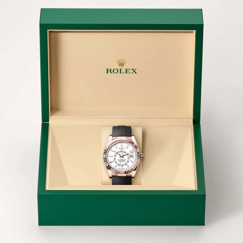 Rolex Sky-Dweller in 18 Karat Everose-Gold in grüner Schatulle