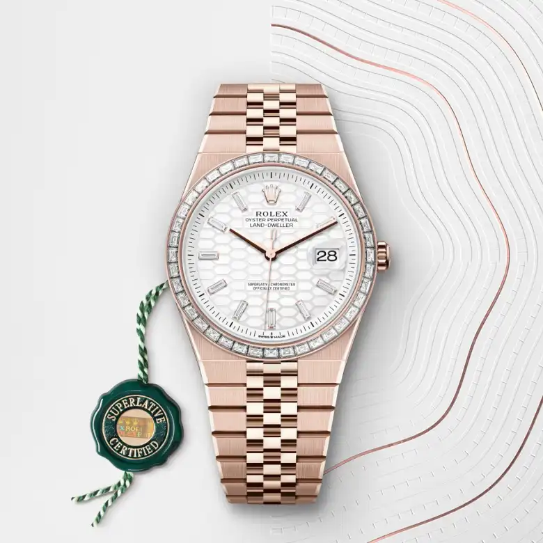Rolex Land-Dweller in 18 Karat Everose-Gold mit grünem Siegel