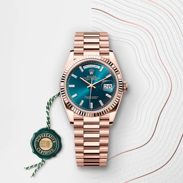 Rolex Day-Date in 18 Karat Everose-Gold mit grünem Siegel